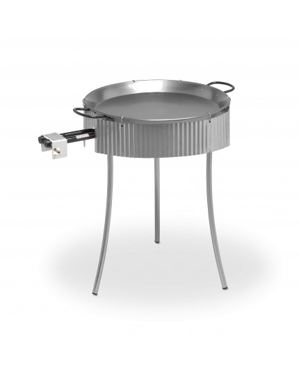 Paravientos universal ajustado a una paellera al aire libre.